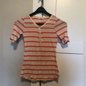 Pink and white striped shirt sleeve